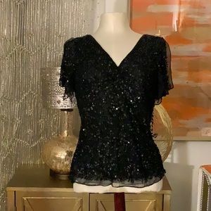 Peplum beaded black top